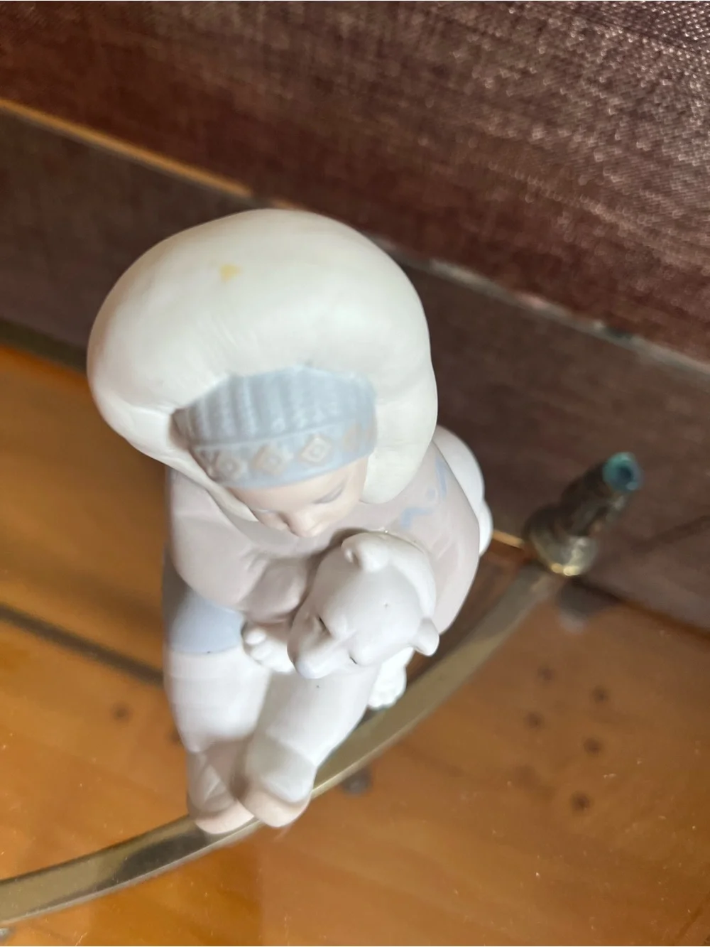 Retired Lladro “Eskimo Playing” matte bisque figurine
